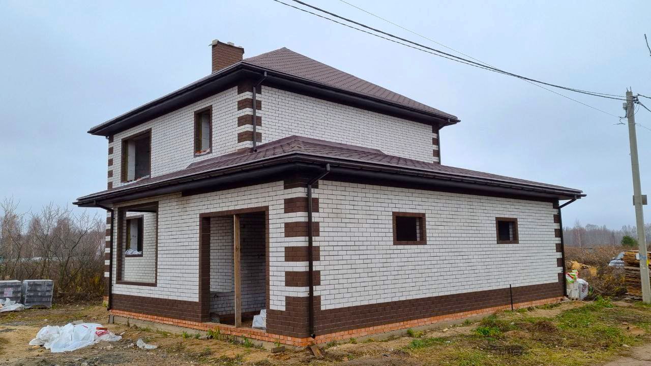 Кирпичный дом с гаражом 150 м3